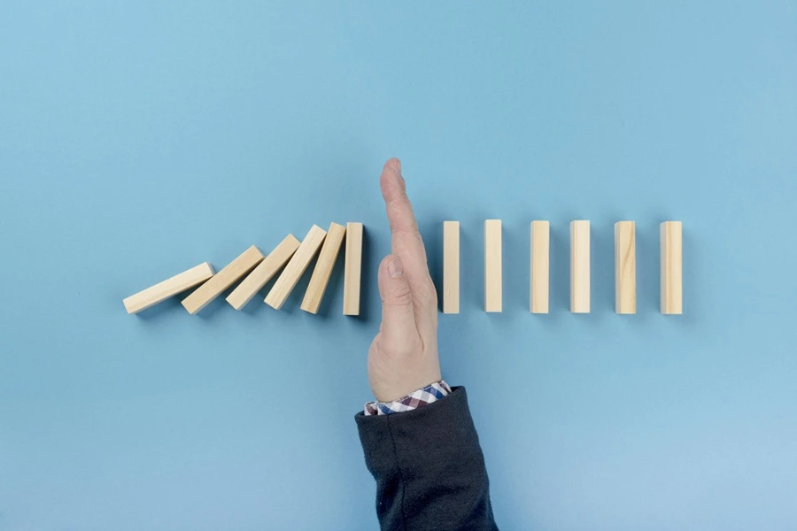 Project manager analyzing a PMBOK-aligned probability-impact risk matrix